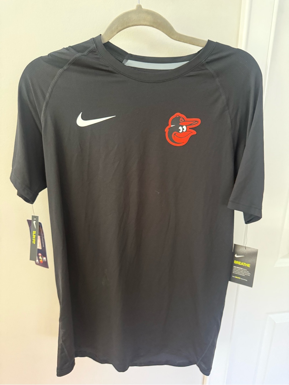 Nike Men’s Black Short Sleeve Orioles Dri-FIT Tee with Orange Logo